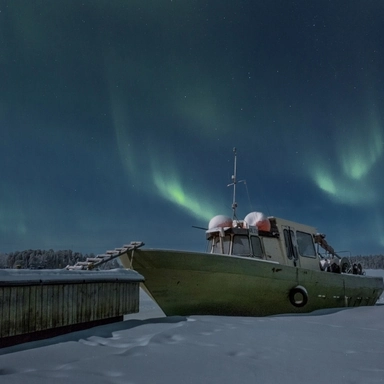 Boat under Auroras